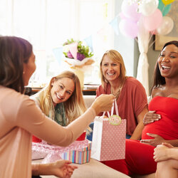 When To Have Baby Shower Top Tips For Planning Woman Giving Gift Pregnant