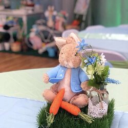 Fine Two Stuffed Animals Sitting On Top Of Table With Flowers And Carrots Shower Rabbit Peter Baby Party